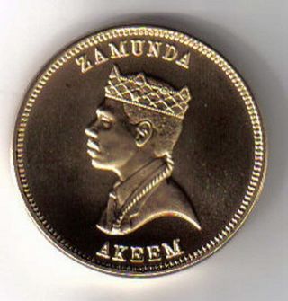 1988 Zamunda Akeem Five Pound Coin.  Gold Eddie Murphy Edition Rare Authentic Unc photo
