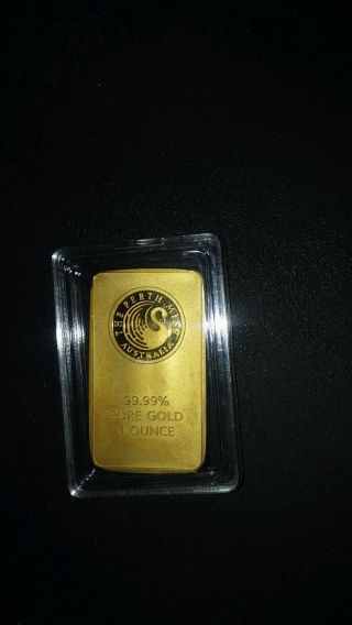 1 Troy Ounce.  999 Fine Gold Clad Perth Bar Please Read photo