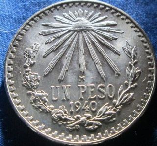 Mexican Caps And Rays; 1940 Un Peso Coin Uncirculated; 720 Silver photo