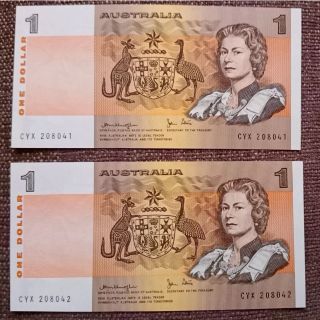 One Dollar Australia (1979).  Consecutive Pair.  About Uncirculated. photo