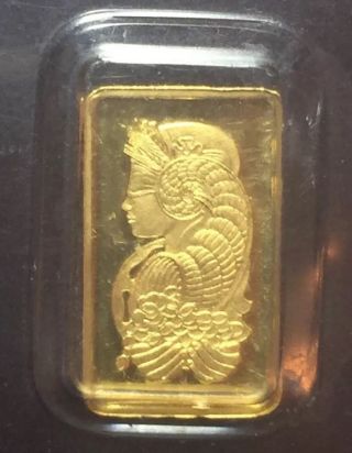 1 Gram Gold Bar Swiss Made Pamp Gold Bar photo