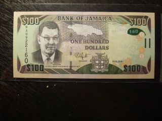 Jamaica 2014 100$ Banknote A.  U,  Cond photo
