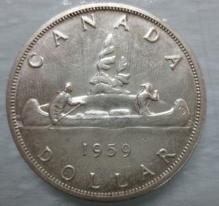 Canada 1959 Voyageur Silver Uncirculated Dollar photo