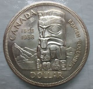 Canada 1958 Totem Silver Uncirculated Dollar photo