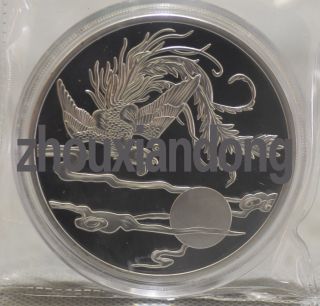 99.  99 Chinese Shanghai 5oz Silver Coin - Phoenix photo