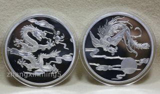 99.  99 Chinese 2014 Shanghai 5oz Silver Coin - Dragon Phoenix T1 photo