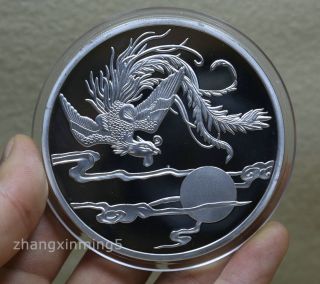 99.  99 Chinese 2014 Shanghai 5oz Silver Coin - Phoenix T6 photo