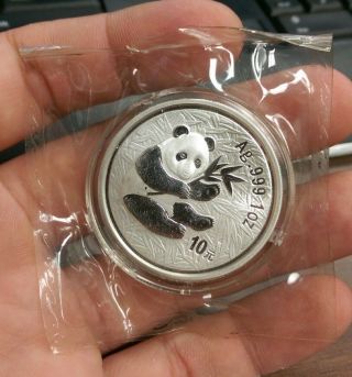 2000 China 1oz 10 Yuan Silver Panda In Capsule Cracks photo