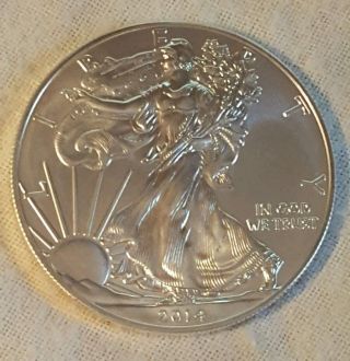 2014 American Eagle Silver Dollar 1 Troy Ounce.  999 Fine Silver U.  S.  Coin photo