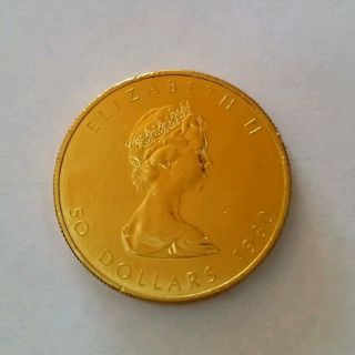Canadian 1 Oz Gold Maple Leaf Coin Brilliant Uncirculated photo