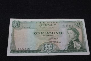 1960s States Of Jersey One Pound Banknote Sn F723416 photo