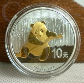 China 2014 10 Yuan Panda Gilded Bu Silver Coin photo