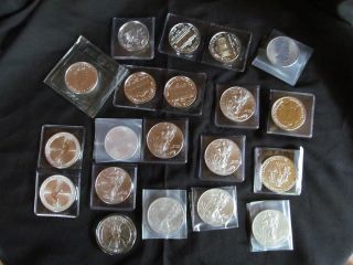 Twenty 1 Oz Silver Coins; Silver Eagles,  Maples,  Kangaroos,  And More.  999 Unc. photo