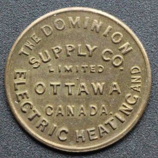 Ottawa,  Canada: Dominion Supply Co.  Electric Heating Brass Token,  Ca.  1898 photo