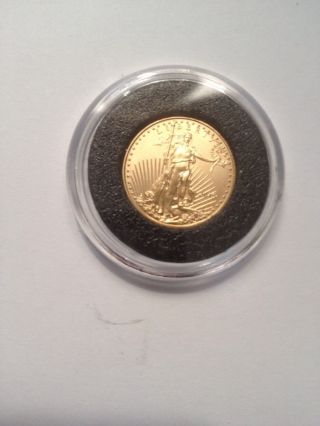 2015 1/10 Ounce American Gold Eagle - Uncirculated - $5.  00 Gold Coin photo