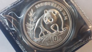 1990 China 10 Yuan 1 Oz.  999 Fine Silver Panda - Package W/capsule photo