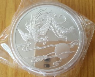 China 99.  99 Phoenix Shanghai 5oz Silver Coin photo