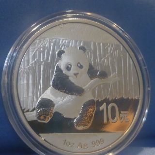 2014 1 Troy Ounce.  999 Fine Silver Chinese Panda Coin.  B.  U photo