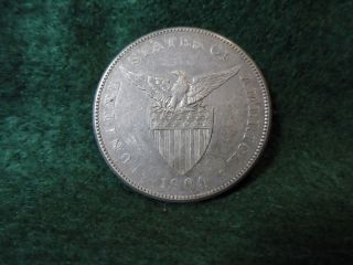 1904 - S Philippines One Peso Coin - United States Administration Era photo