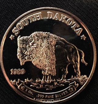 1989 South Dakota State Seal 1889 Centennial 1 Troy Ounce.  999 Fine Silver Coin photo