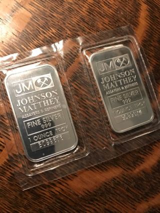 (2) Johnson Matthey Silver Bar 1 Oz 999 Silver (& Numbered) photo