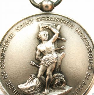 Antique Art Medal Pendant With Decors Of Martyr Saint Sebastian photo