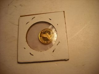 1/10 Troy Oz.  999,  Fine Gold Round.  Golden Eagle Coin photo