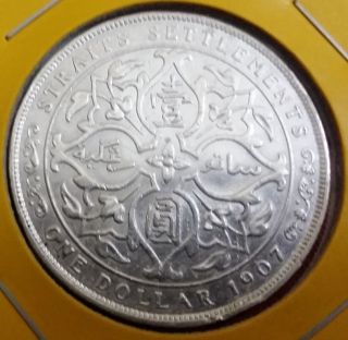 Straits Settlements 1907 $1 Silver Dollar Coin. photo