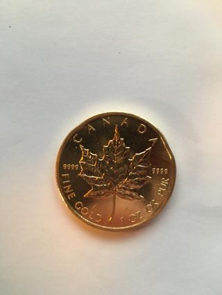 2009 1 Oz Gold Canadian Maple Leaf.  99999 Variety (abrasions) photo