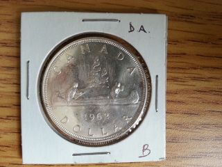 1962 Canada Silver Dollar - Double Arrow Head.  Grade.  See Pics.  B photo
