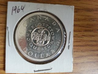 1964 Canada Silver Dollar - Grade.  See Pics. . photo