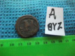 Large (30mm) Byzantine Coin,  Eastern Roman Empire,  Ancient. .  (a - Byz) photo