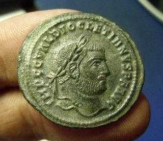 Large Roman Silvered Follis,  Diocletian,  295/6 A.  D,  9.  8g,  29mm,  Genius Reverse photo
