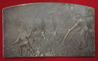 Silver Plaque Depicting An Agricultural Scene photo