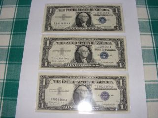 1957 - B Three Consecutive $1 / Uncirculated Silver Certificates photo