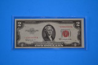 One 1953 C Uncirculated $2.  00 Red Seal Star Note photo