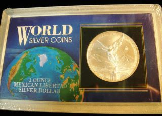 2000 Mexico Libertad.  999 Silver 1 Troy Oz Coin World Silver Coin Case Cat.  $80 photo