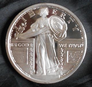 One Oz Silver Round.  999 Pure - Liberty Standing Lady - Uncirculated Bu photo