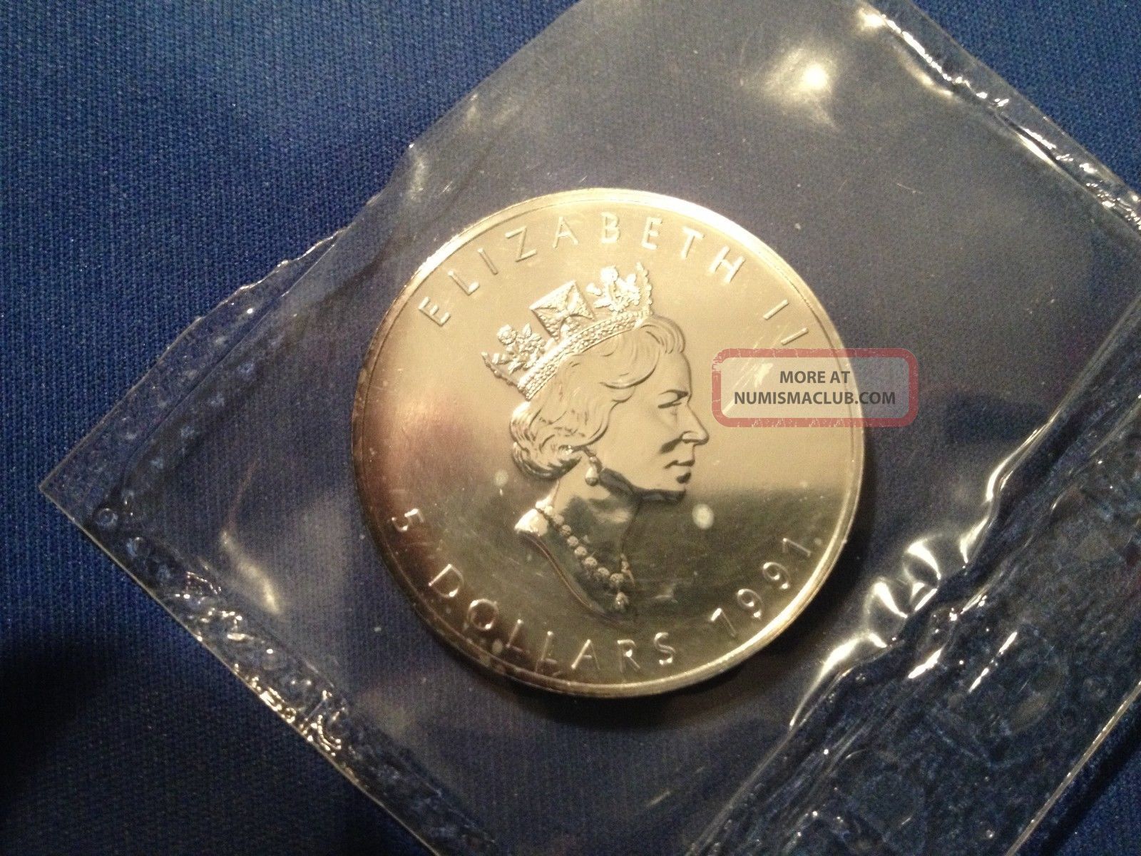 1991 canadian maple leaf silver coin bu ripped opened rcm seal