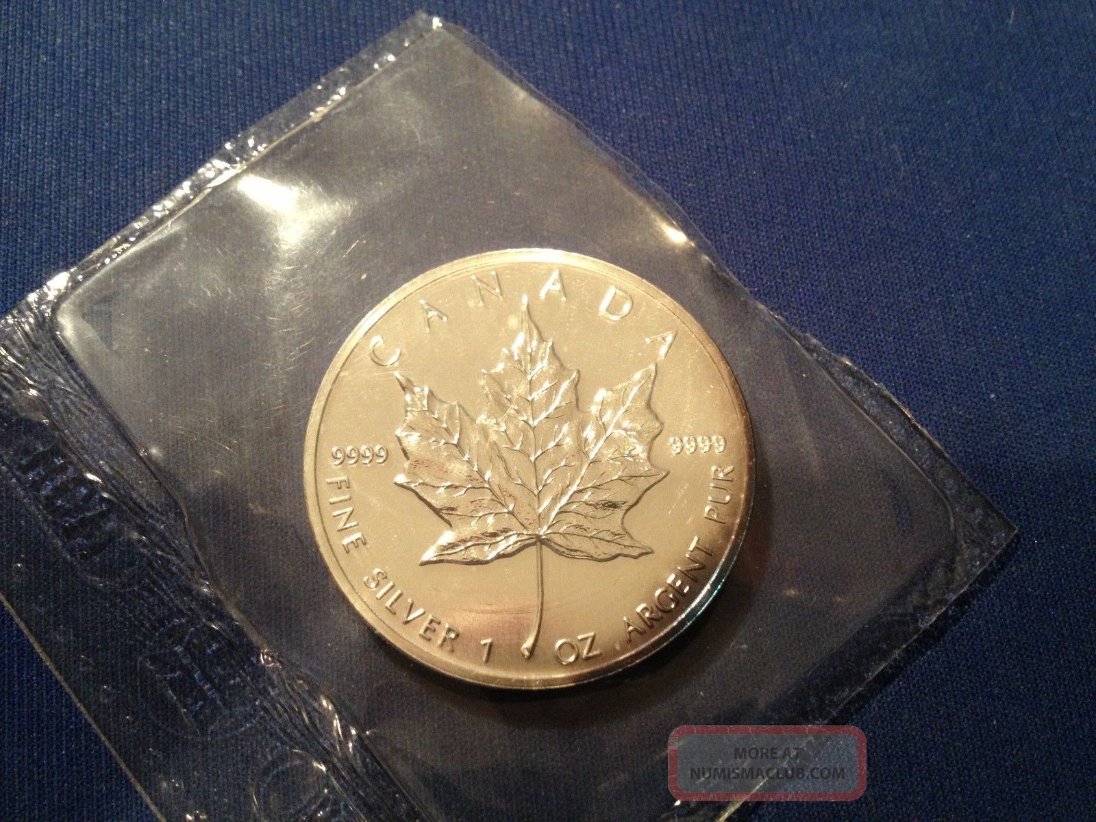 1991 canadian maple leaf silver coin bu ripped opened rcm seal