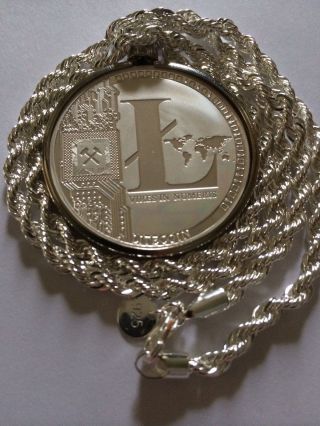 Litecoin Coin Pendant On Silver Rope Chain Necklace. photo