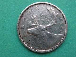 1960 Canadian Quarter (25c Silver Coin).  1267 photo