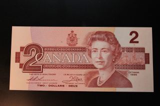 Canadian 1986 $2 Bill Bird Series.  The Bill Is,  Crisp & Uncirculated. photo