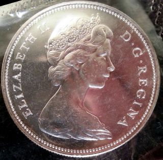 Brilliant Uncirculated 1966 Large Beads Canada Silver Dollar In Cello photo