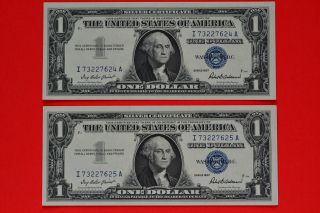Two 1957 Consecutive & Uncirculated $1.  00 Silver Certificates photo