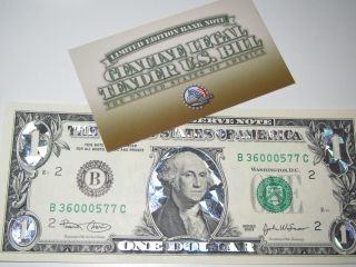 One Dollars Bill In Silver photo