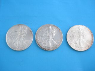 Estate - - Three (3) 1999 American Eagle Silver Dollars - - Bullion - Unc==free photo
