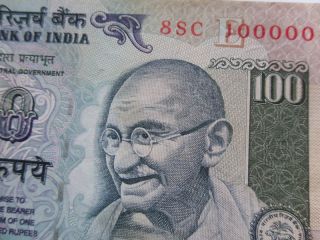 - India Paper Money - Rs.  100/ - Mahatma Gandhi - Fancy No.  :no:8sc 100000 E14 photo