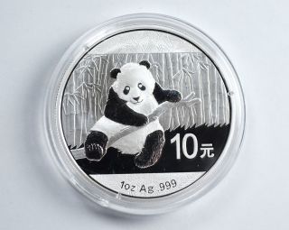 1 Oz.  Silver Coin.  999 Fine 2014 Chinese Panda 10 Yuan In Cap photo