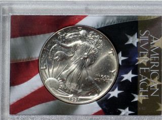 1991 Silver American Eagle $1 Brilliant Uncirculated.  Starting Bid $0.  01 photo